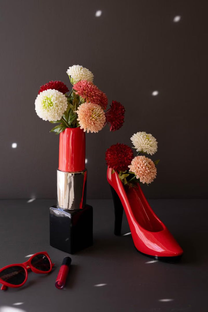 Set of two ceramic lipstick and high heel vases